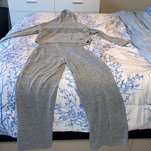 Gray jogging suit with silver sequence on the hoody